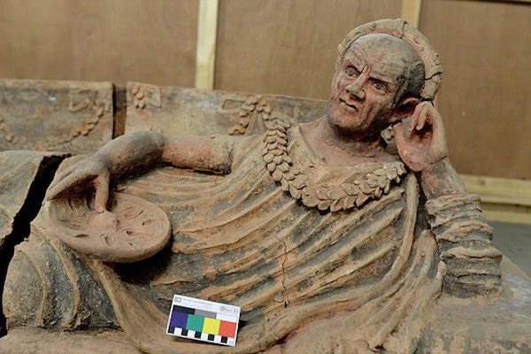  Etruscan sarcophagi of a man reclining. 