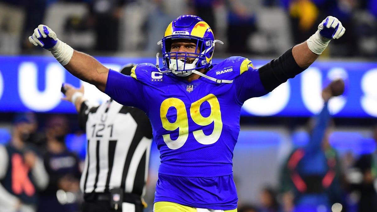 Los Angeles Rams defensive end Aaron Donald (99) celebrates in the fourth quarter during the NFC Championship Game against the San Francisco 49ers at SoFi Stadium.