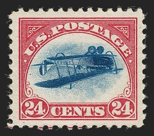 The stamp shows an upside-down Curtiss “Jenny” biplane. (Robert A. Siegel Auction Galleries)