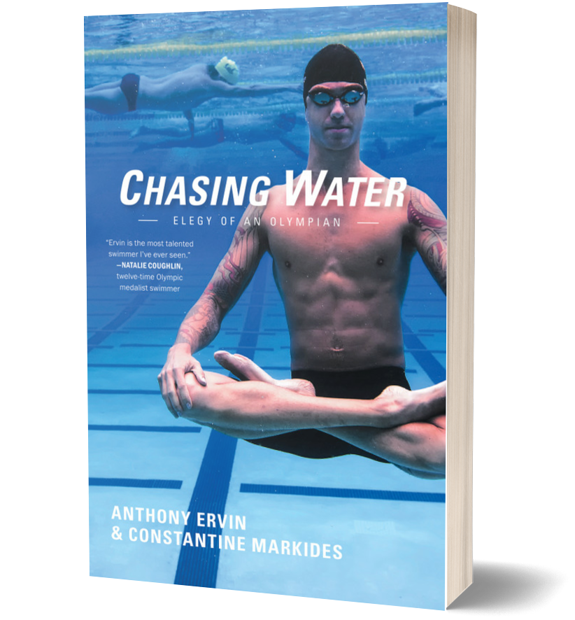 Book cover of a swimmer, Anthony Ervin, in lotus position at the bottom of the pool, titled "Chasing Water: Elegy of an Olympian" by Anthony Ervin and Constantine Markides