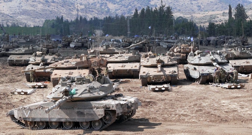 Tanks and armoured personnel carriers on the Lebanon border before the invasion