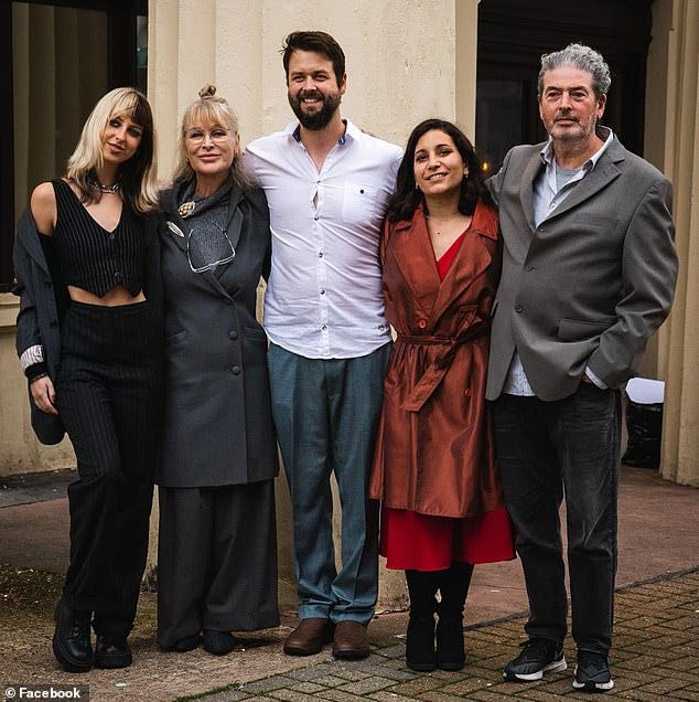 Ms Royle, second from the left, posted this image of her husband Julian, far right, on Instagram