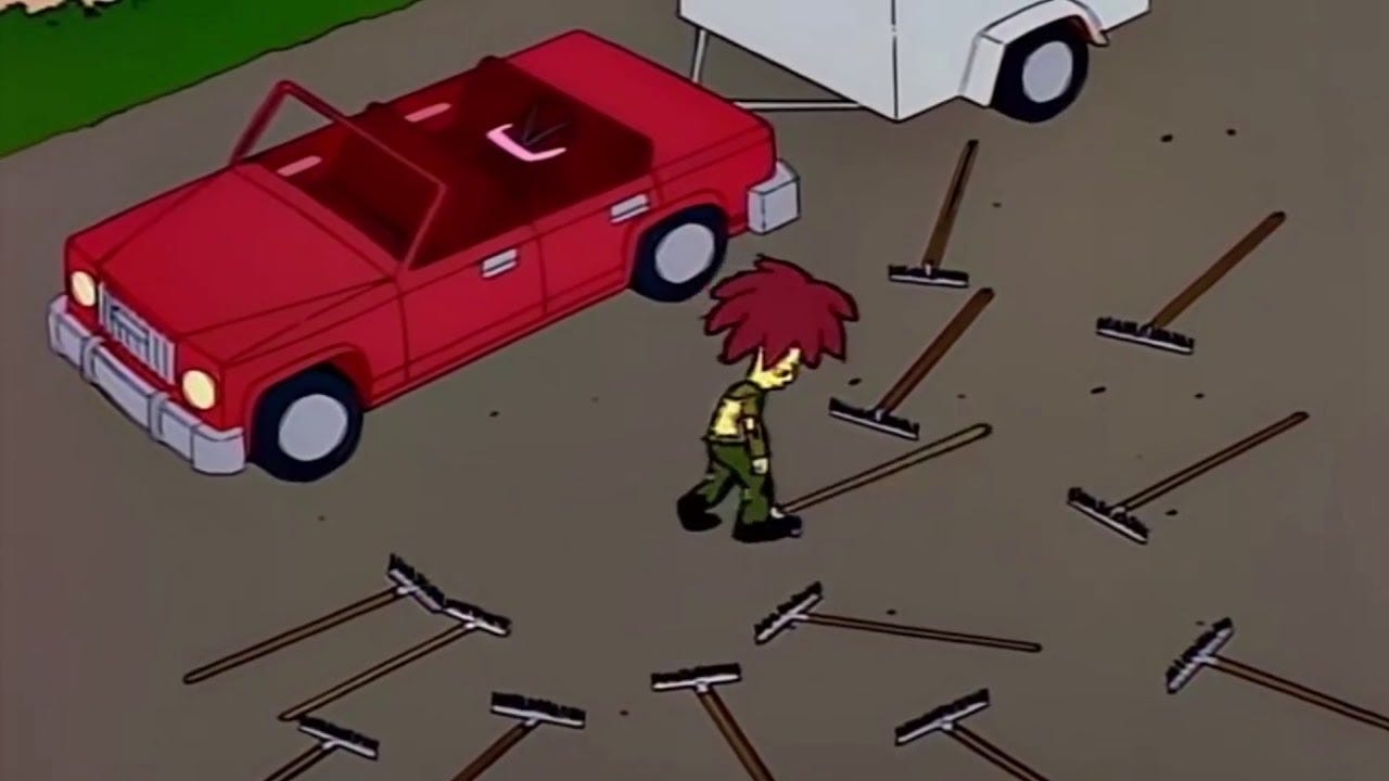 Sideshow Bob walking on rakes