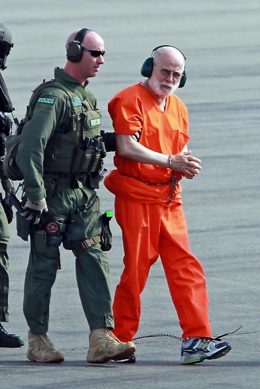 (063011, Boston, MA) Whitey Bulger is taken from a Coast Guard helicopter to an awaiting Sheriff's vehicle after attending Federal Court in Boston. Thursday, June 30, 2011. (Staff photo by Stuart Cahill)