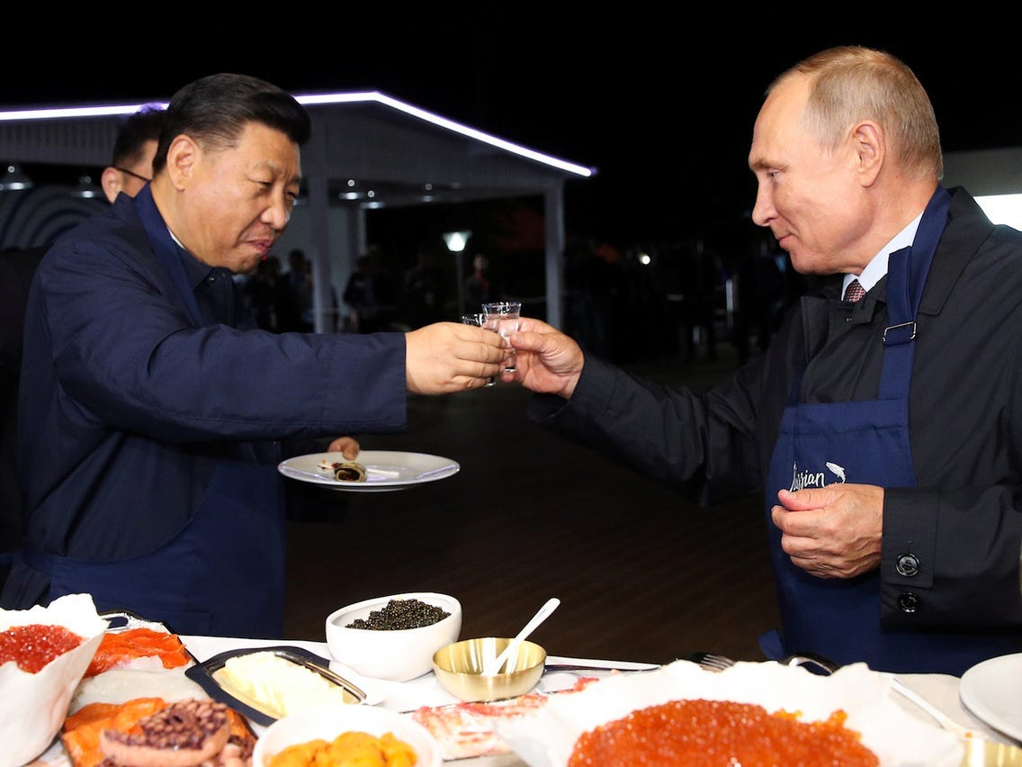 Vladimir Putin and Xi Jinping Made Pancakes With Caviar in Wild Photos
