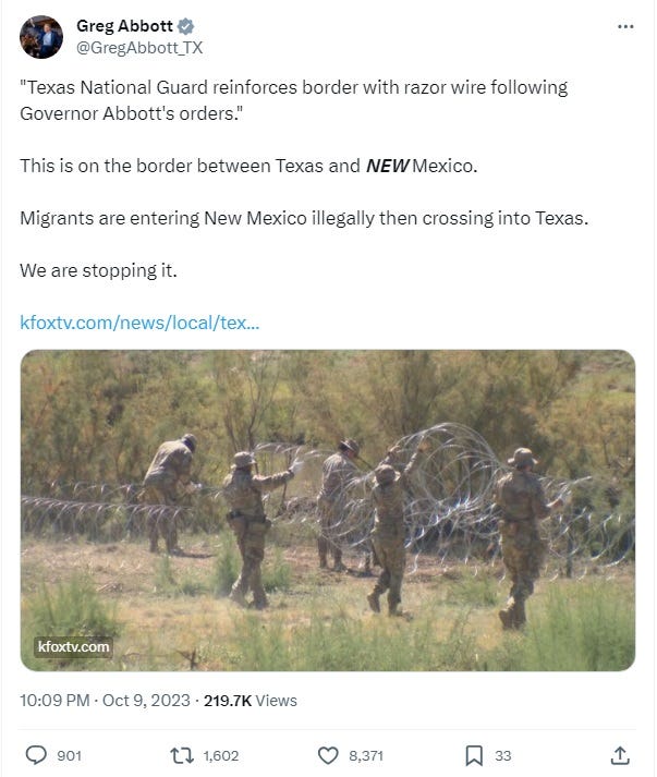 Tweet from Greg Abbott: '"Texas National Guard reinforces border with razor wire following Governor Abbott's orders."  This is on the border between Texas and NEW Mexico.  Migrants are entering New Mexico illegally then crossing into Texas.  We are stopping it.' Photo shows National Guard soldiers in camouflage laying rolls of concertina wire in the desert