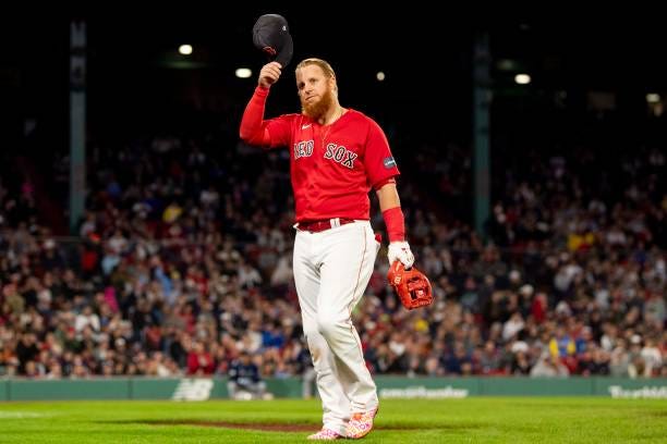 Justin Turner of the Boston Red Sox reacts as he is removed from the game in the sixth inning against the Tampa Bay Rays on September 27, 2023 at...