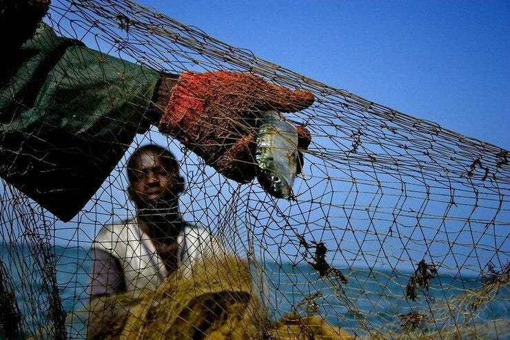 Pescadores no Senegal. Fotografía de Javier Teniente na exposición Fillos do océano