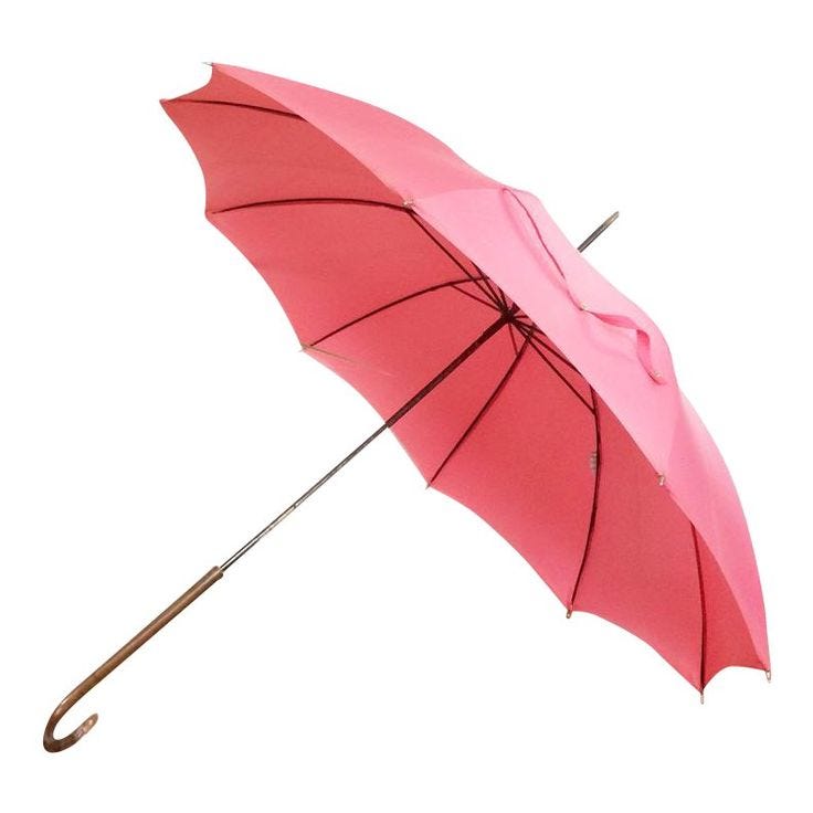 A cheerful salmon colored umbrella