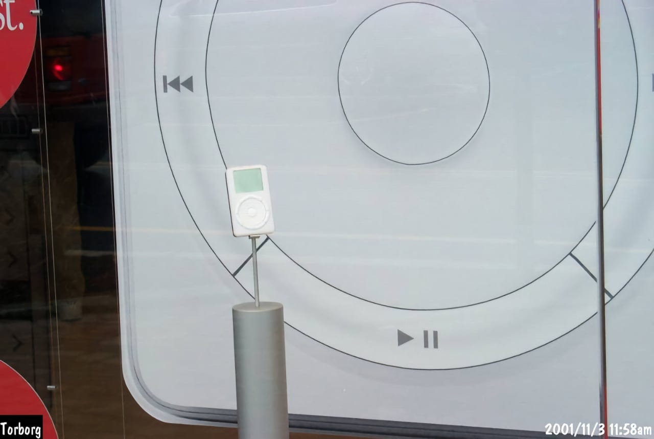 An original iPod stands on a pedestal in the window of Apple Tice's Corner on November 3, 2001.