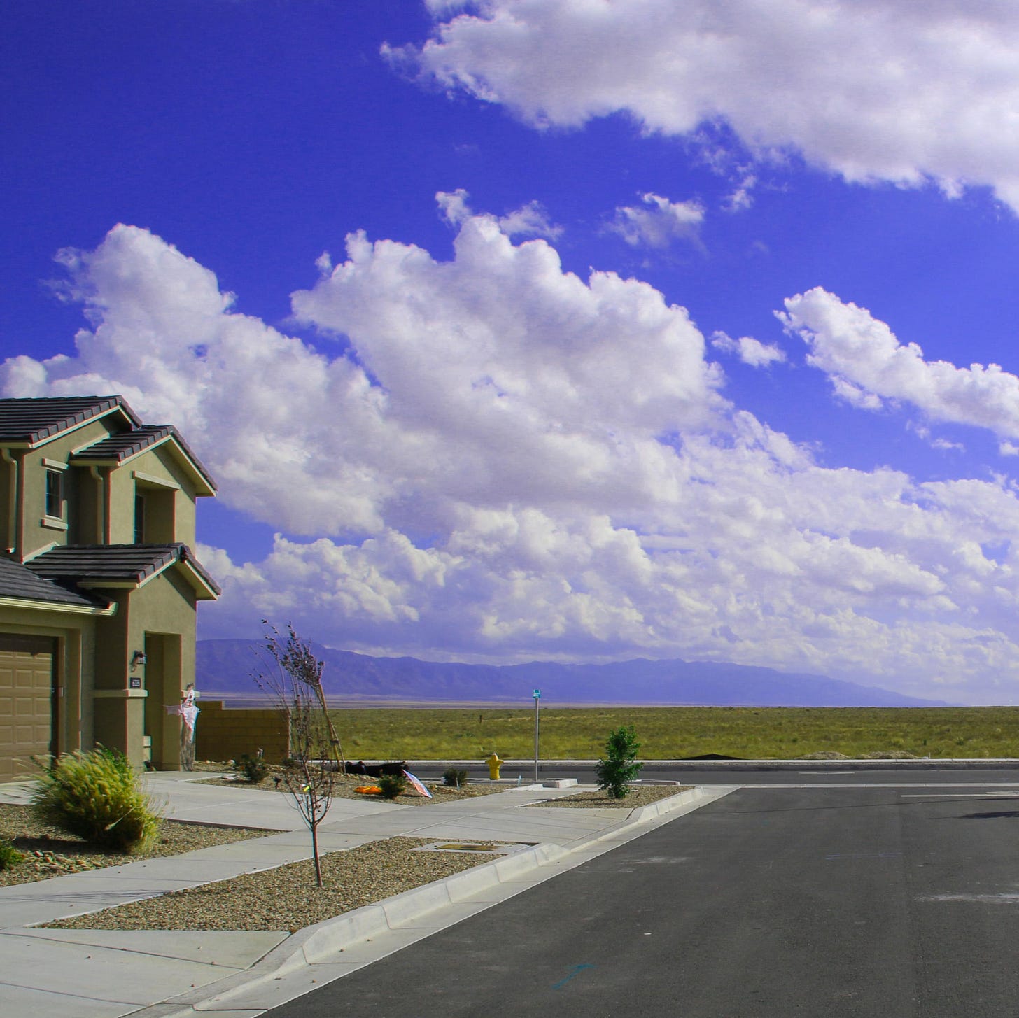 r/LiminalSpace - a road leading to a house.