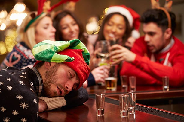 Man Passed Out On Bar During Christmas Drinks With Friends Stock Photo -  Download Image Now - iStock