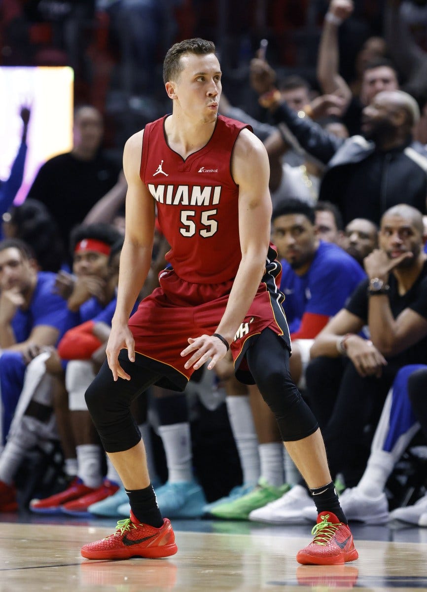 Miami Heat forward Duncan Robinson (55) reacts after a three point basket  against the Philadelphia 76ers during the second half at Kaseya Center. |  HoopsHype