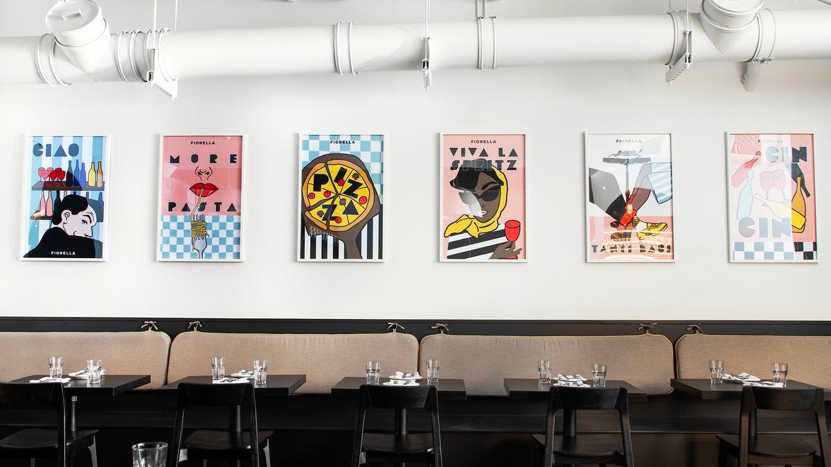 The interior of Fiorella Noe in San Francisco, decorated with illustrations from artist Alyssa Rusin