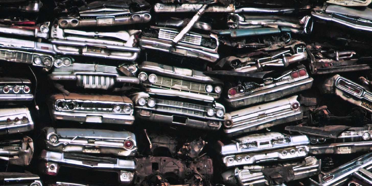 pile of cars at a wreckers yard pile of cars at a wreckers yard