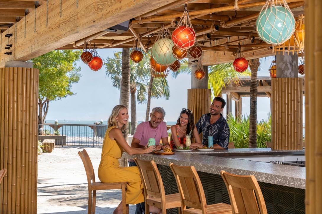 People sitting at the Tiki Bar.