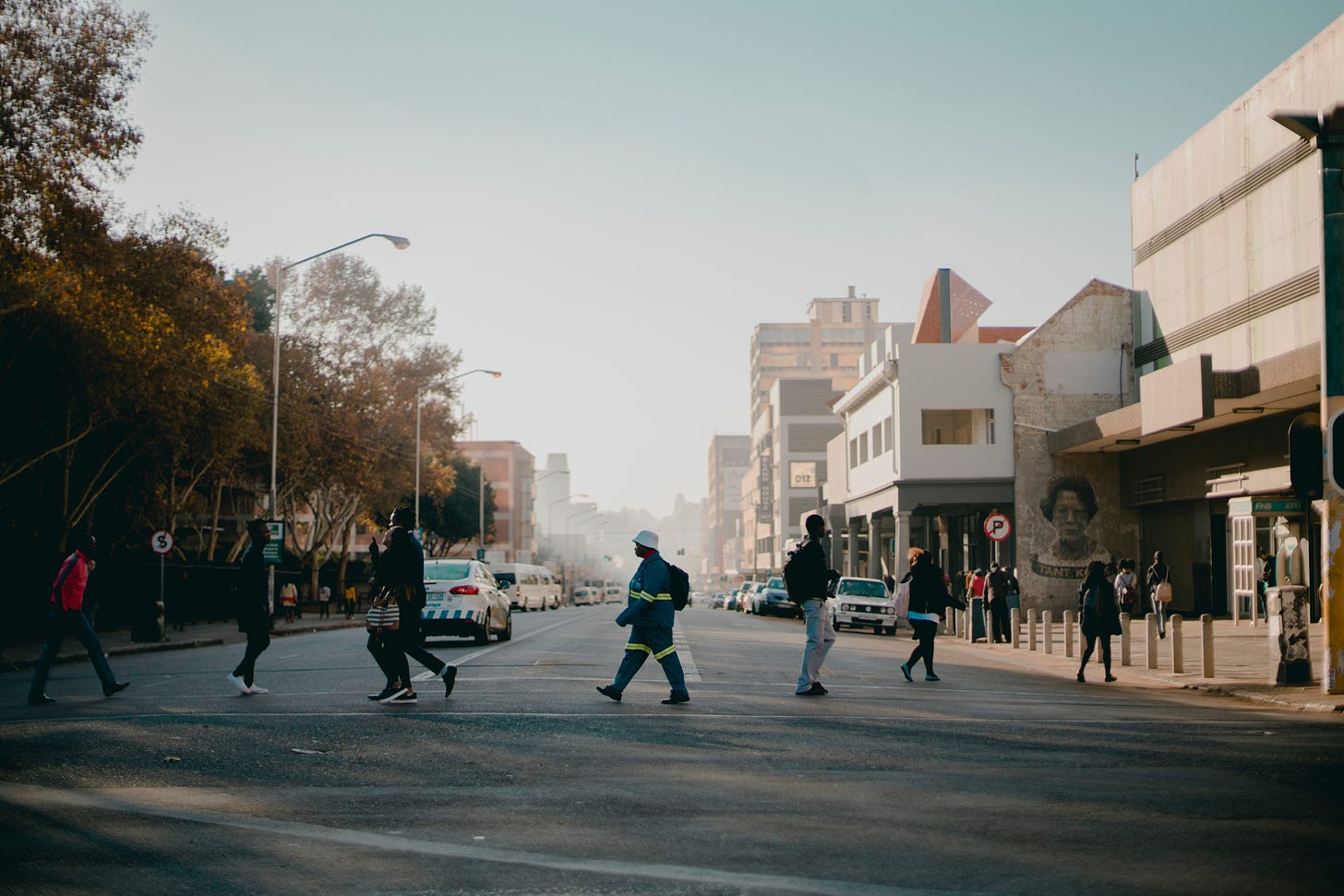 People crossing street in Pretoria, South Africa.