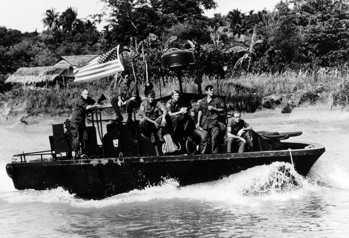 A group of people on a boat

Description automatically generated