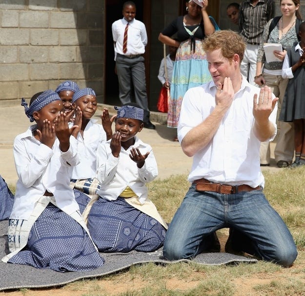 Prince Harry Breaks Hearts, Busts Moves At School For Deaf Children