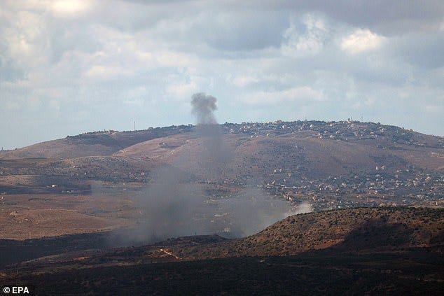 Smoke rises from an Israeli airstrike on the village of Blida in southern Lebanon, as seen from an undisclosed location in the Upper Galilee, northern Israel, 17 September 2024