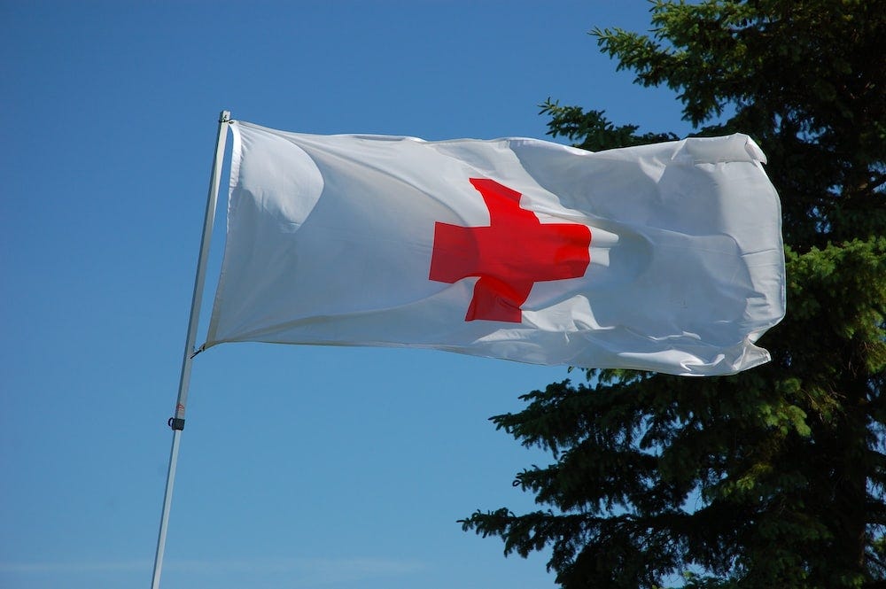 white and red flag on pole white and red flag on pole