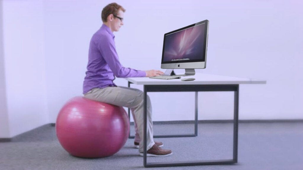 reduce back pain by sitting on an exercise ball