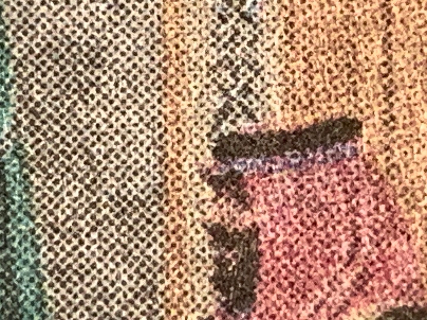 An extreme closeup detail of a photograph in the print edition of the New York Times, so the halftone dots of the printing process are enlarged. Detail contains an image of Mohammad bin Salman