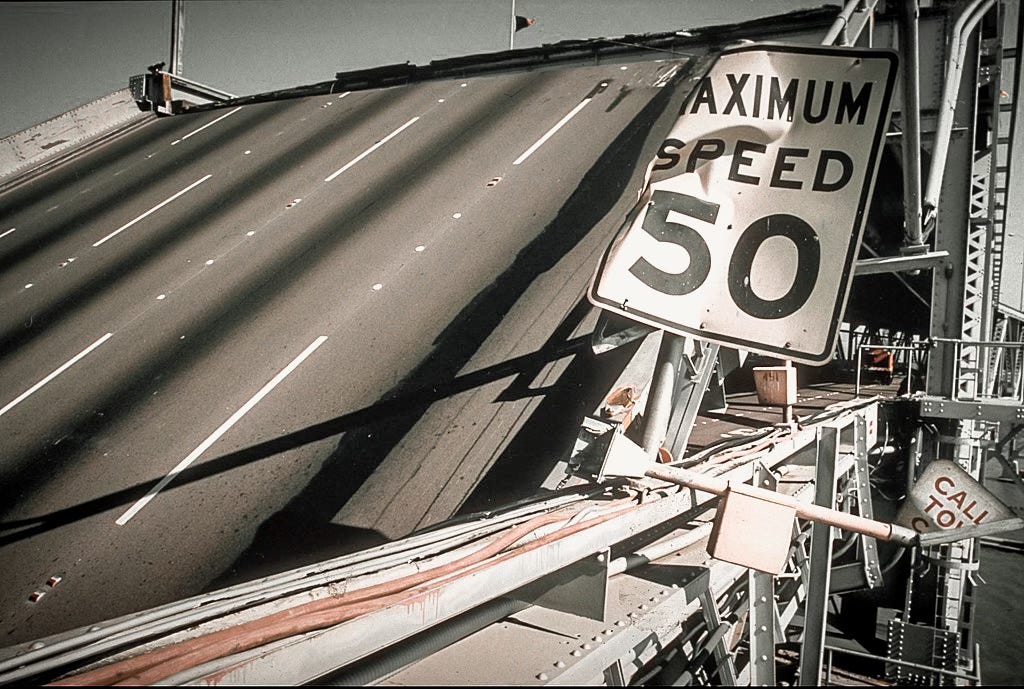 Photo of a crumbled overpass from the earthquake of 1989 in the Bay Area of California