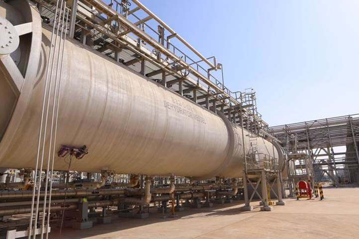 A picture containing sky, building, industry, pipe

Description automatically generated