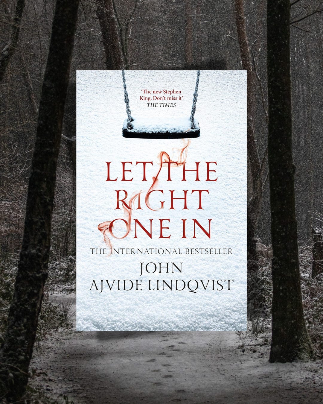 Let the Right One In by John Ajvide Lindqvist paperback front cover on a snowy forest back drop