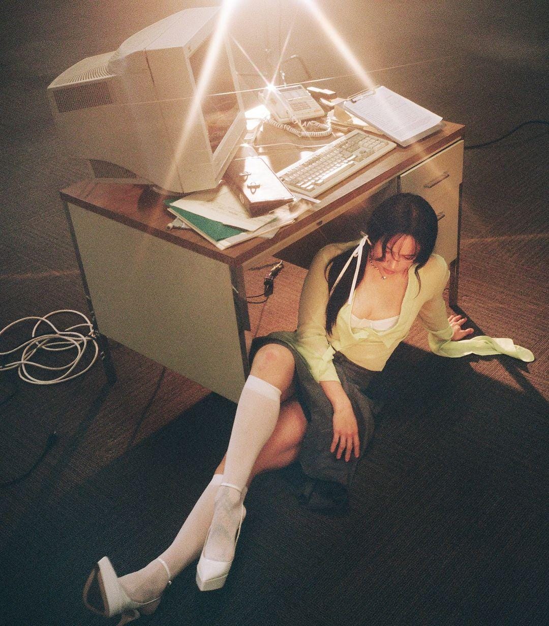 An Instagram  post added on Jun 08, 2024. The author is @petrafcollins. May present: girl, table, furniture, leg, desk.