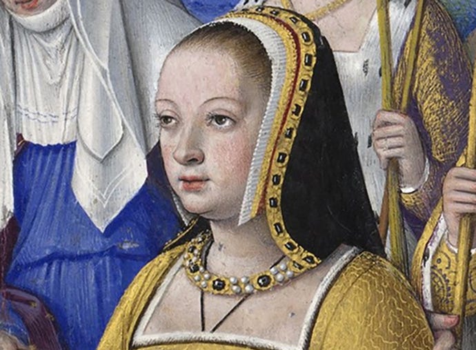 Close-up of a person wearing a headdress

Description automatically generated