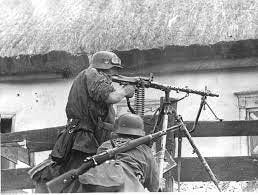 Waffen-SS soldiers from „Wiking” Division with MG 34 and Kar98k in soviet  village - PICRYL - Public Domain Media Search Engine Public Domain Search