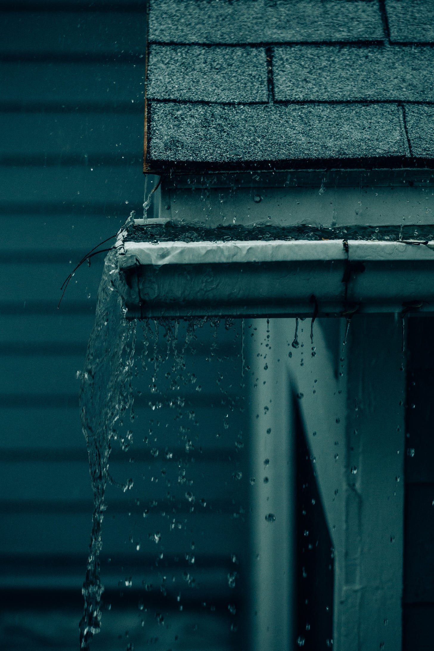 overflowing rain gutter