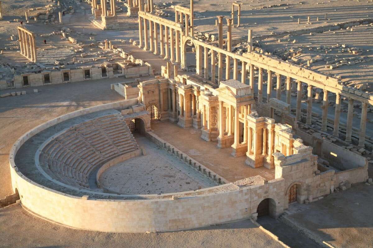 An aerial view taken in 2009 shows Palmyra's impressive amphitheater. Immediately behind it is the 3,600-foot long colonnade that welcomed visitors to the city. UNESCO warned that the destruction of the ancient city would be "an enormous loss to humanity."