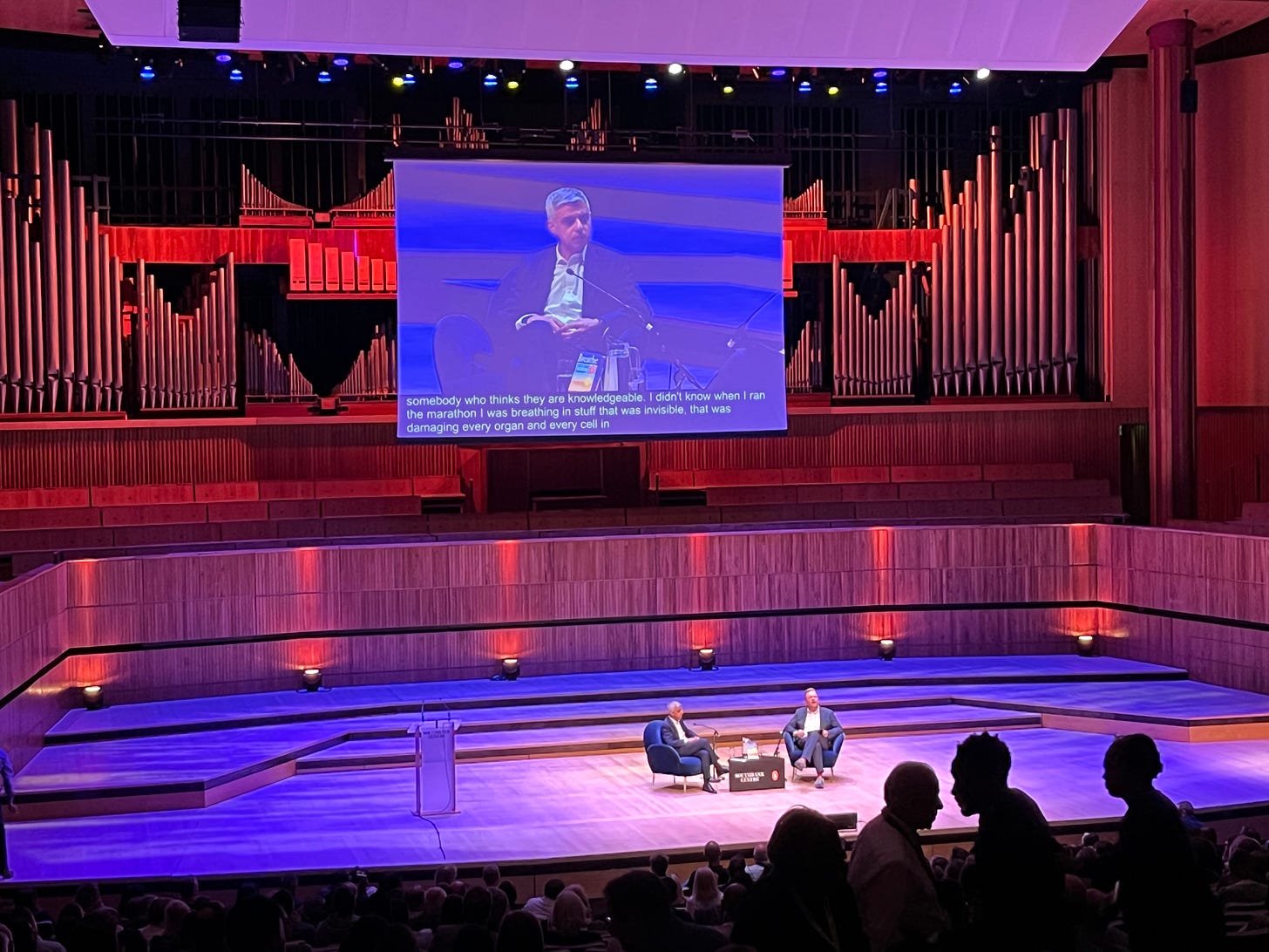 Photograph of Sadiq Khan and James O'Brien on stage