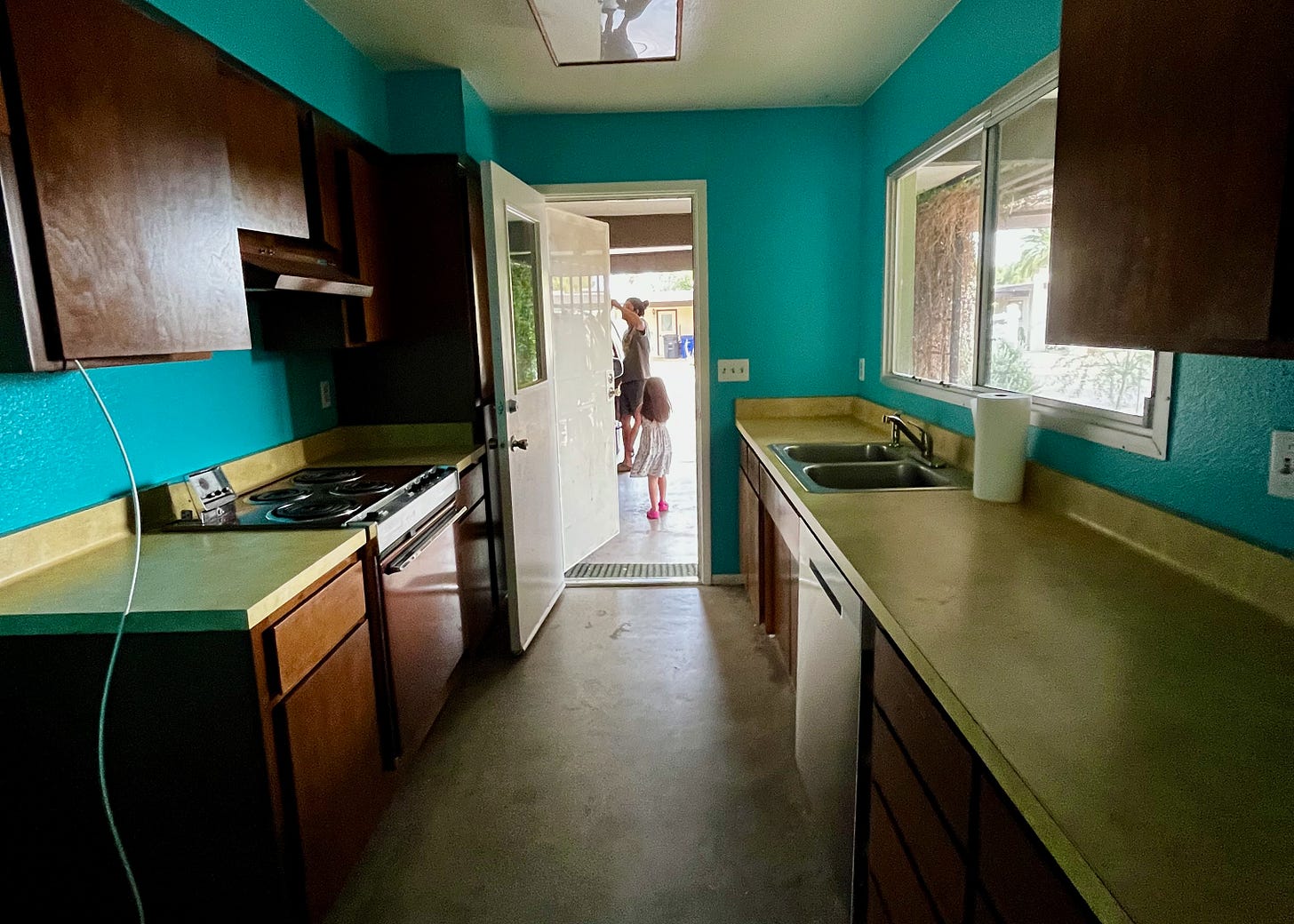 The last picture I took of my kitchen as we locked up. You can see my daughter and husband walking out the door.