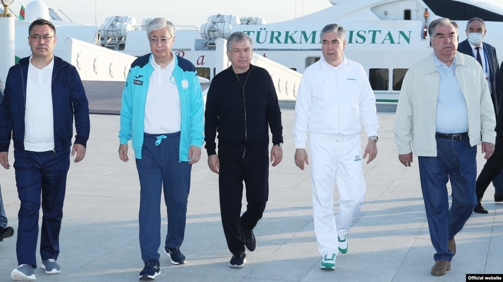 The five Central Asian leaders -- Kyrgyzstan's Sadyr Japarov (left to right), Kazakhstan's Qasym-Zhomart Toqaev, Uzbekistan's Shavkat Mirziyoev, Turkmenistan's Gurbanguly Berdymukhammedov, and Tajikistan's Emomali Rahmon -- gather in Awaza, Turkmenistan, for a summit in August 2021.