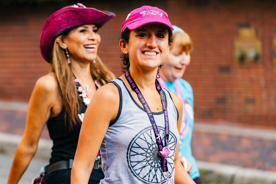 Runners supporting breast cancer day. Runners supporting breast cancer day.