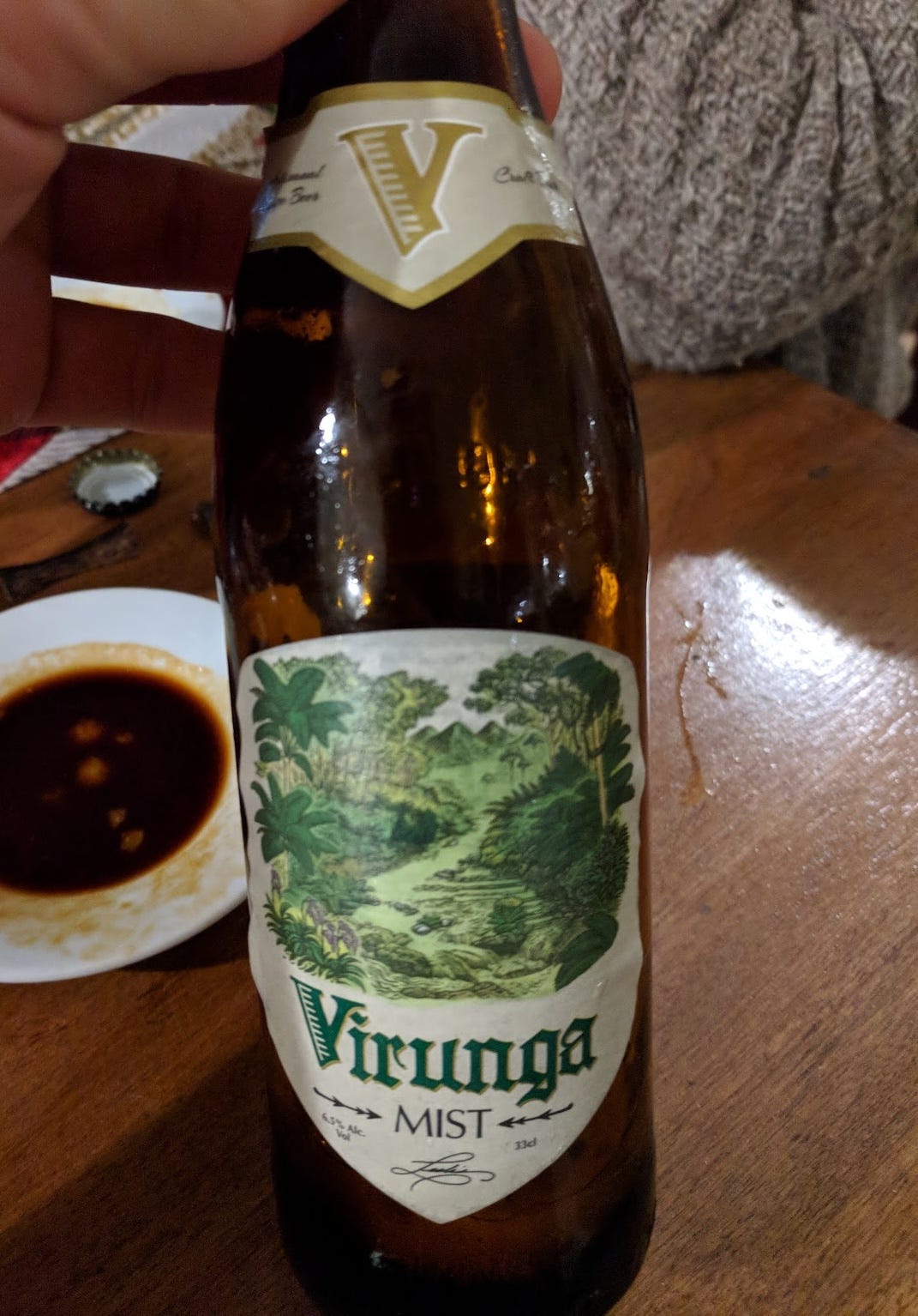 A bottle of beer with a label showing the name "Virunga Mist"