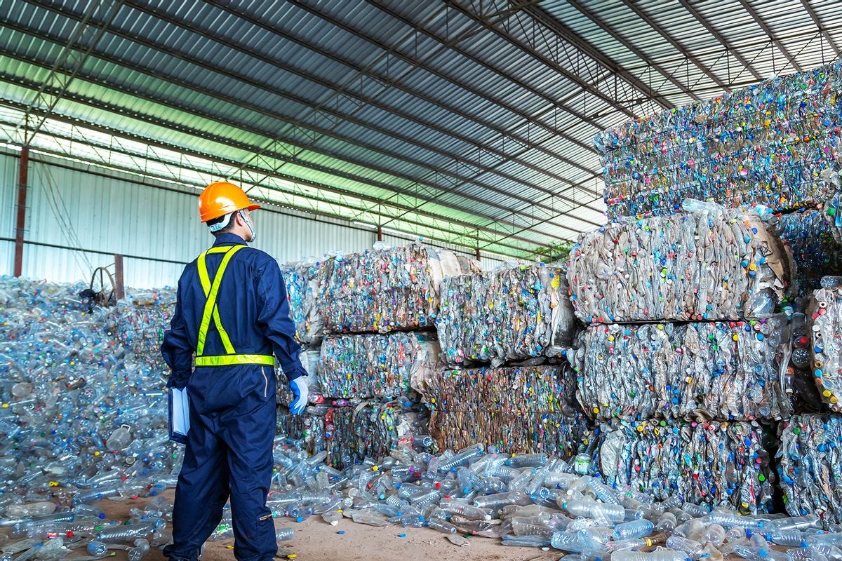 Engineer at recycling center (Getty Images/Pramote Polyamate)