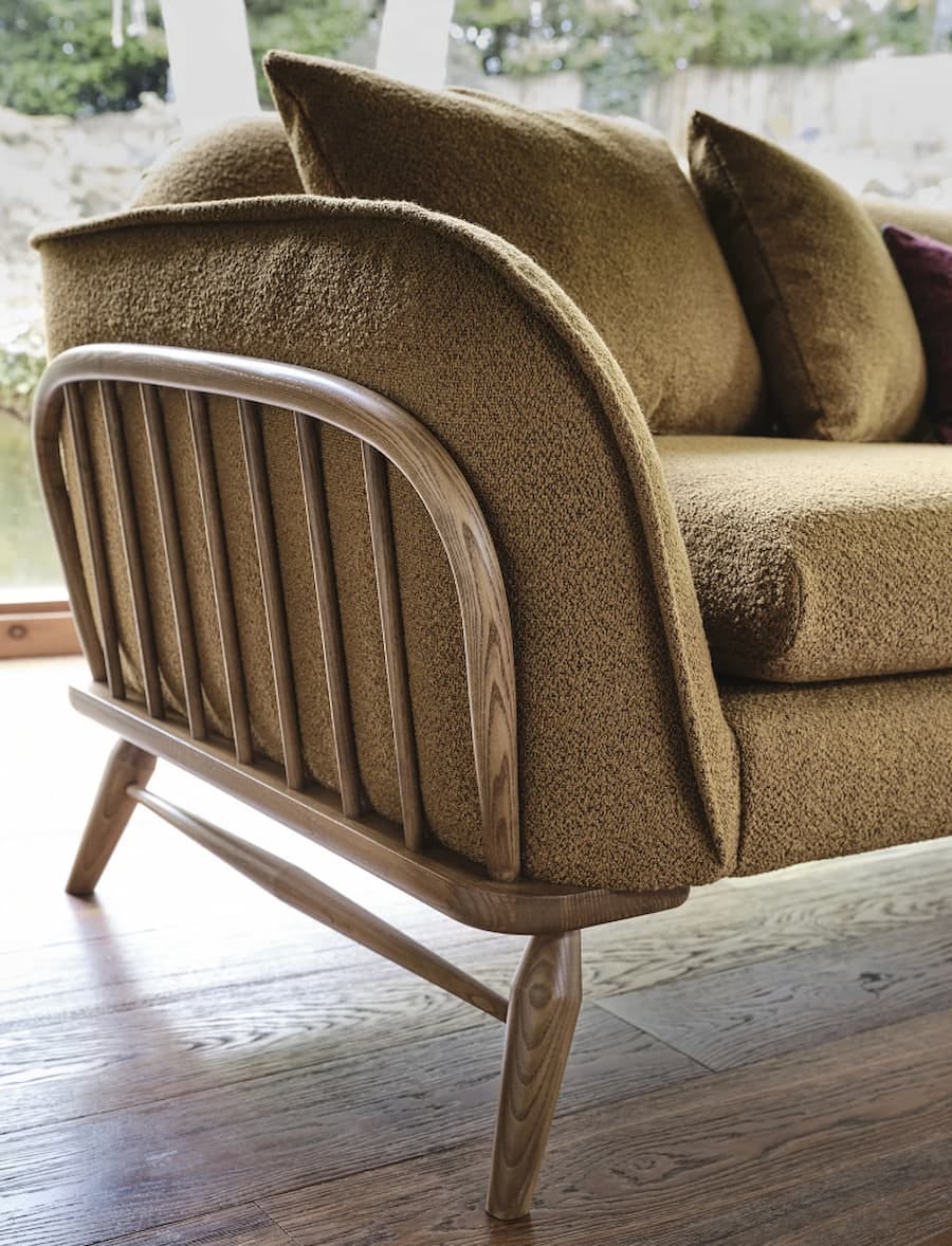 statement curved wooden frame which links with the original studio couch