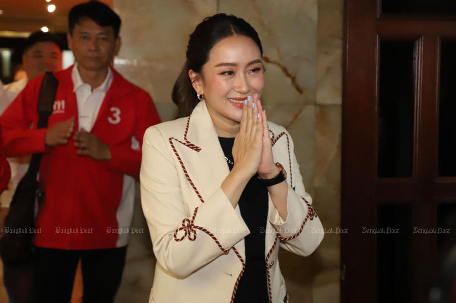 Paetongtarn Shinawatra arrives at a ceremony marking the 16th anniversary of the Pheu Thai Party at its headquarters in Bangkok on Sept 19, 2023. The 37-year-old Pheu Thai leader is elected the country's 31st prime minister on Friday. (Photo: Varuth Hirunyatheb)