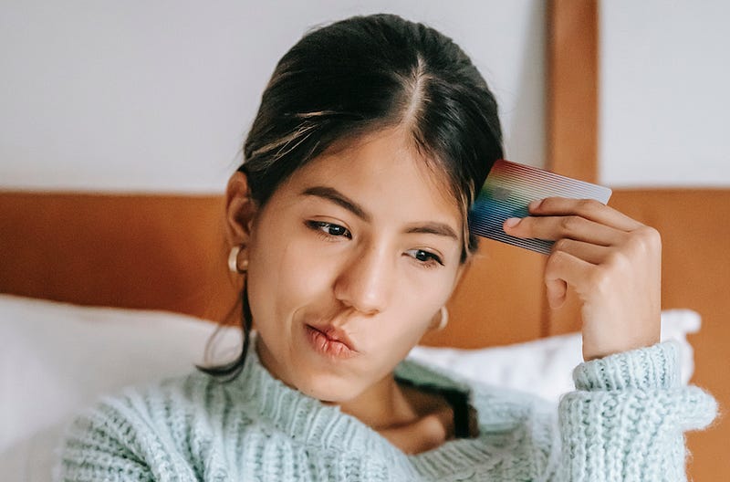 A woman with her credit card