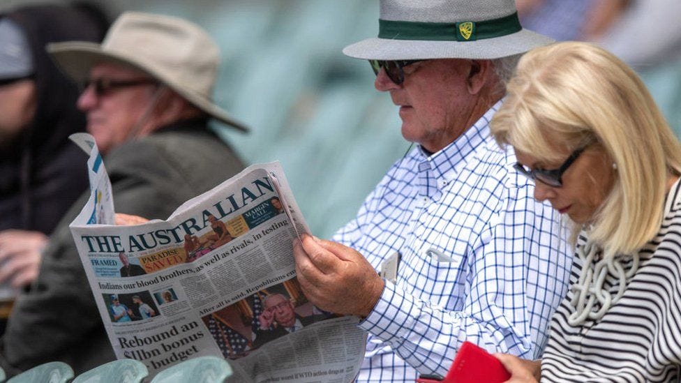 Man reading a newspaper