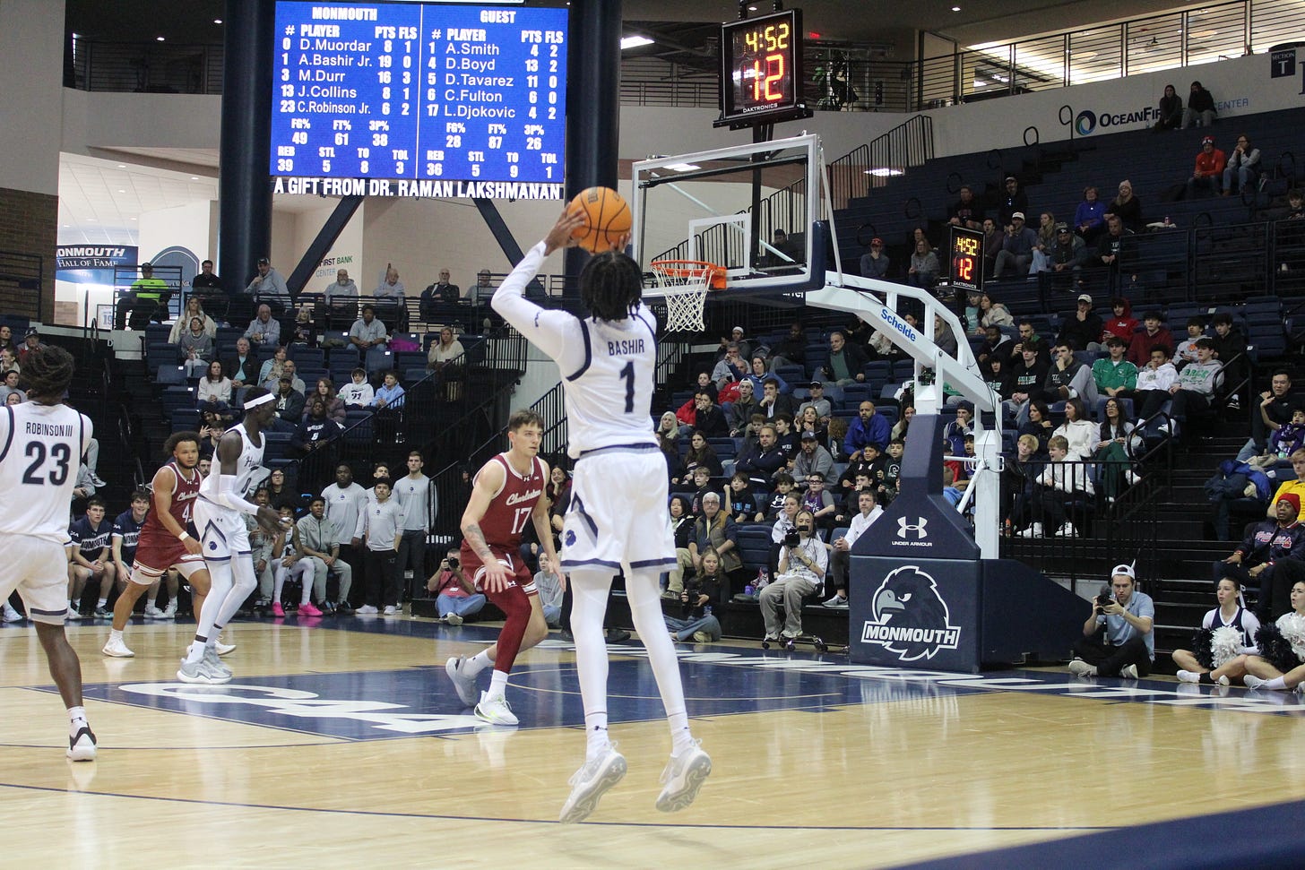 Abdi Bashir Jr. attempts a 3-pointer during Monmouth’s win over Charleston on Jan. 11, 2025. (Photo by Adam Zielonka)