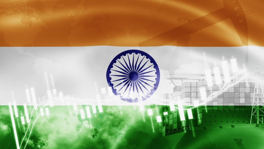 India flag, stock market, exchange economy and Trade, oil production, container ship in export and import business and logistics.
