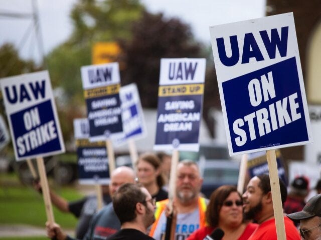 LANSING, MICHIGAN - SEPTEMBER 29: United Auto Workers members strike the General Motors Lansing Delta Assembly Plant on September 29, 2023 in Lansing, Michigan. Today the UAW expanded their strike against General Motors and Ford, claiming there has not been substantial progress toward a fair contract agreement. Photo by Bill …
