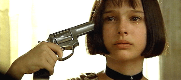 an image of Natalie Portman as Mathilda holding a gun to her head