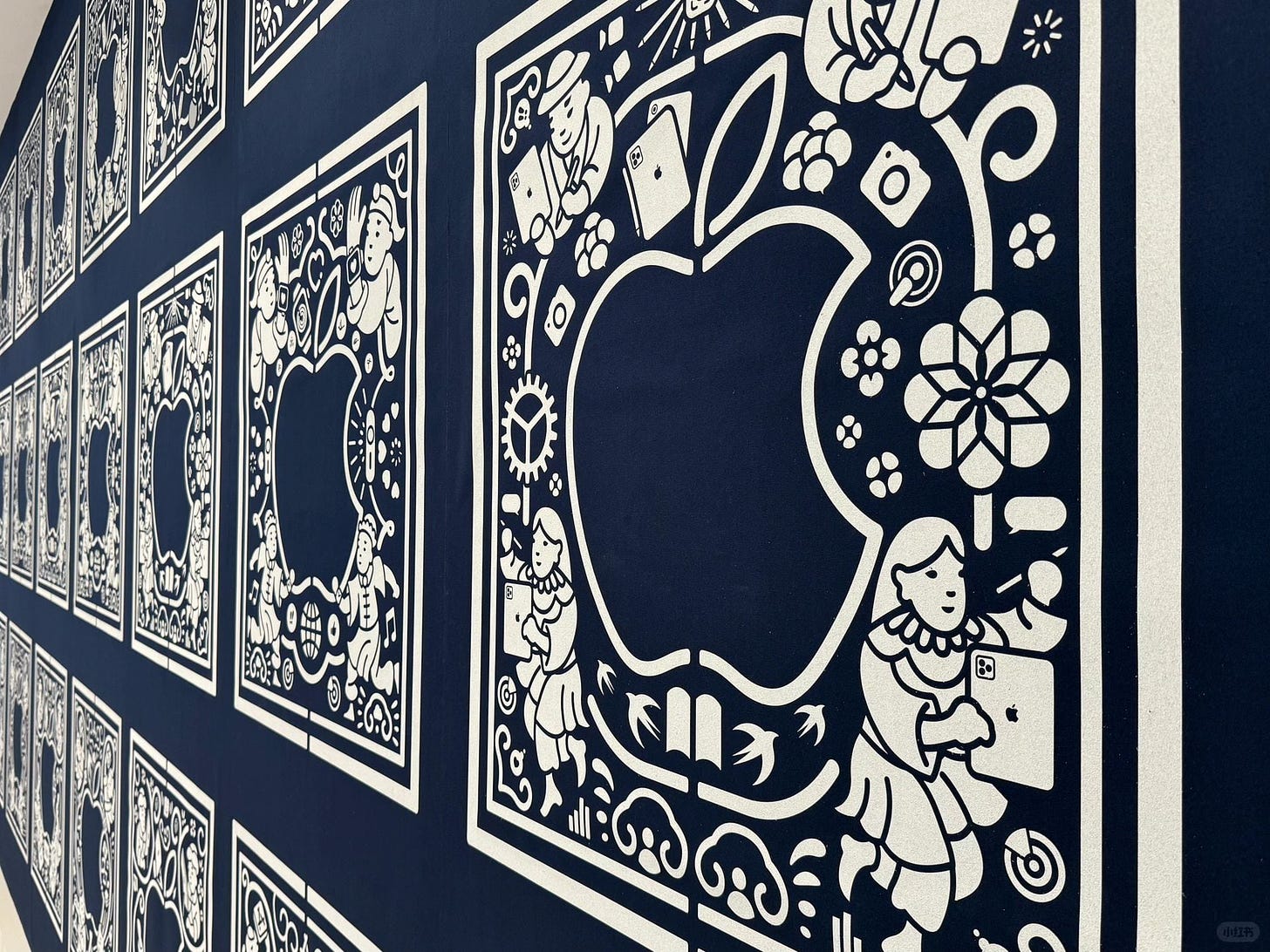 Close-up detail shot of the fabric banners at Apple MixC Wenzhou.